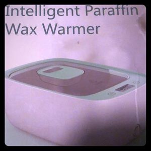 Intelligent paraffin wax warmer
